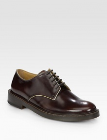 Perfectly polished with contrasting trim defines this traditional lace-up for the contemporary man of style.Leather upperLeather liningPadded insoleLeather soleMade in Italy