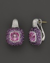 Cushion-cut pink corundums sparkle against pave amethyst in a beautiful sterling silver settings. By Judith Ripka.