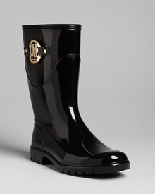 These abbreviated Love Moschino rain boots are right in step with the latest, wet-weather trend: glossy rubber punctuated with bold, gold hardware. These abbreviated Love Moschino rain boots are right in step with the latest, wet-weather trend: glossy rubber punctuated with bold, gold hardware.