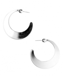 Flat-out fabulous! Hoop earrings are a must-have for any casually chic wardrobe, but Nine West updates the look with this unique flat design. Set in silver tone mixed metal. Approximate diameter: 2-1/2 inches.