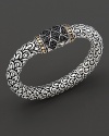 From John Hardy's Naga Collection, this dragon-inspired chain bracelet features a blend of gold and silver, with fine etching detail at clasp. Designed by John Hardy.