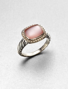 From the Noblesse Collection. A pretty pink mother-of-pearl cabochon center surrounded by a diamond accented border set in sterling silver cable shank. Pink mother-of-pearlDiamonds, .21 tcwSterling silverWidth, about .39Imported From the Noblesse Collection. A pretty pink mother-of-pearl cabochon center surrounded by a diamond accented border set in sterling silver cable shank. Pink mother-of-pearlDiamonds, .21 tcwSterling silverWidth, about .39Imported