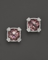 Brilliant raspberry crystal is framed in sterling silver on these timeless Judith Ripka studs.