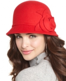 Petal perfect. Bring a touch of warm weather to a chilly day with this flower-adorned wool cloche by Nine West. Petal perfect. Bring a touch of warm weather to a chilly day with this flower-adorned wool cloche by Nine West.
