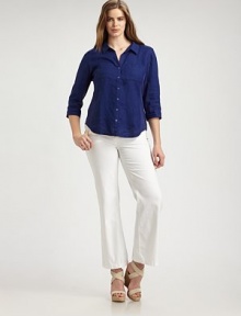 From its chic, three-quarter sleeves to its ultra-feminine, curved hem, you will adore this classic button-down shirt made from soft, lightweight linen. Collar neckThree-quarter sleevesButton frontPatch pocketsCurved hemBack yokeAbout 26 from shoulder to hemLinenMachine washImported