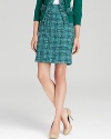 Rich texture and a daring shade put a new spin on the classic kate spade new york tweed skirt. Polish off the feminine style with a color-pop cardigan and nude pumps.