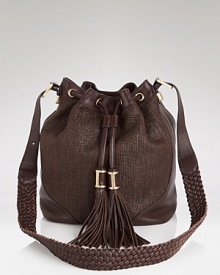 Rachel Zoe channels a vintage vibe with this slouchy, drawstring shoulder bag. In raffia and leather, it's a hippie-chic way to work this season's textured trend. Rachel Zoe channels a vintage vibe with this slouchy, drawstring shoulder bag. In raffia and leather, it's a hippie-chic way to work this season's textured trend.