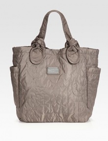 Signature letter stitching is at the center of this roomy carryall, complete with a logo metal plaque and delicately-knotted top handles. Double top handles, 7 dropMagnetic snap closureTwo outside open pocketsOne inside zip pocketTwo inside open pocketsLogo-printed canvas lining13W X 14¾H X 4½DImported Signature letter stitching is at the center of this roomy carryall, complete with a logo metal plaque and delicately-knotted top handles. Double top handles, 7 dropMagnetic snap closureTwo outside open pocketsOne inside zip pocketTwo inside open pocketsLogo-printed canvas lining13W X 14¾H X 4½DImported
