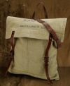 Washed-out military font and a square structure add vintage character to this rugged tote bag.