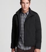 Whether you're strolling downtown through a flurry or guarding against the chill during your morning commute, this puffer maintains your modern look and keeps you warm all the while. From Theory.