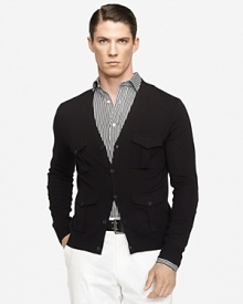 Bellows pockets channel rugged military styling on an otherwise polished V-neck cardigan, crafted in a trim fit from sumptuous Italian merino wool. Bellows pockets channel rugged military styling on an otherwise polished V-neck cardigan, crafted in a trim fit from sumptuous Italian merino wool.