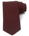 A subtle pattern adorns this plush Italian silk tie for a handsome addition to your fine dressed-up wardrobe.