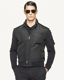 A powerful combination of rugged military inspiration and modern craftsmanship, the Loft bomber jacket channels a contemporary vibe in soft, mercerized fleece with sleek microfiber facing. A powerful combination of rugged military inspiration and modern craftsmanship, the Loft bomber jacket channels a contemporary vibe in soft, mercerized fleece with sleek microfiber facing.