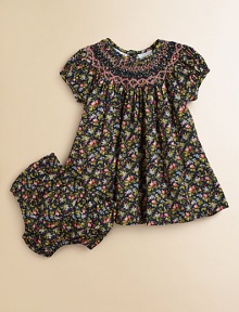 Tailored in airy cotton for a gently flowing silhouette, a darling short-sleeved floral-print dress is beautifully complemented with a smocked neckline and embroidery. Round smocked necklineShort puffed sleevesBack buttonsFull skirtRuffled hemCottonHand washImported Please note: Number of buttons may vary depending on size ordered. Tailored in airy cotton for a gently flowing silhouette, a darling short-sleeved floral-print dress is beautifully complemented with a smocked neckline and embroidery. Round smocked necklineShort puffed sleevesBack buttonsFull skirtRuffled hemCottonHand washImported Please note: Number of buttons may vary depending on size ordered.