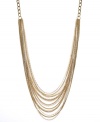 Unveil a new you. INC International Concepts' unique multi-strand necklace blends gold-plated and white-plated mixed metal chains for lovely draped effect. Approximate length: 30 inches. Approximate drop: 3 inches.