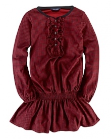Inspired by vintage Americana, this comfy cotton plaid design features a flurry of ruffles along the placket and an elastic smocked drop waist. Inspired by vintage Americana, this comfy cotton plaid design features a flurry of ruffles along the placket and an elastic smocked drop waist.