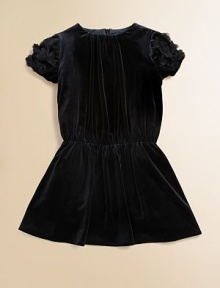 In lush velvet with flower details at the sleeves, this classic dress is perfect for stylish little ones.CrewneckGathered at neckBack zip closureShort sleeves with flower detailsElastic waistFull skirtPolyesterFully linedDry cleanMade in the USA of imported fabric In lush velvet with flower details at the sleeves, this classic dress is perfect for stylish little ones.CrewneckGathered at neckBack zip closureShort sleeves with flower detailsElastic waistFull skirtPolyesterFully linedDry cleanMade in the USA of imported fabric
