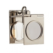 The contemporary design of this Ralph Lauren sconce reflects light off glass and bright nickel. The contemporary design of this Ralph Lauren sconce reflects light off glass and bright nickel.