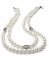 Endless elegance. Lauren Ralph Lauren's double-strand glass pearl necklace features metal accents with pave crystals. Crafted in silver tone mixed metal. Approximate length: 19 inches.