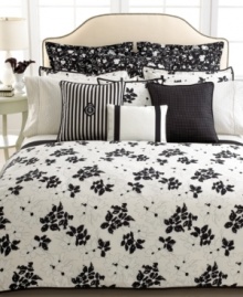 Finish your bed in stylish grace with this Port Palace bedskirt from Lauren by Ralph Lauren, featuring a white floral design on a black ground.