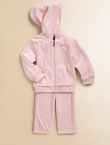 Plush and pretty, cozy and warm, in soft velour with feminine lace insets edging the sleeves and pants.Double layer hoodZip front with J pullGold Juicy chest embroideryRibbed cuffs and waistSplit kangaroo pocketElastic waist pantsCotton/polyesterMachine washImported Plush and pretty, cozy and warm, in soft velour with feminine lace insets edging the sleeves and pants.Double layer hoodZip front with J pullGold Juicy chest embroideryRibbed cuffs and waistSplit kangaroo pocketElastic waist pantsCotton/polyesterMachine washImported