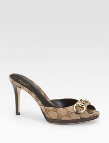 Classic GG fabric with leather trim and metal horsebit at the peep toe.Stacked heel, 4 (100mm) Platform, ¾ (20mm) Compares to a 3¼ heel (80mm) Canvas upper Slip-on style Leather lining and sole Made in ItalyOUR FIT MODEL RECOMMENDS ordering true size. Classic GG fabric with leather trim and metal horsebit at the peep toe.Stacked heel, 4 (100mm) Platform, ¾ (20mm) Compares to a 3¼ heel (80mm) Canvas upper Slip-on style Leather lining and sole Made in ItalyOUR FIT MODEL RECOMMENDS ordering true size.