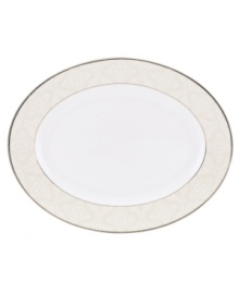 Classic florals and precious platinum give Organdy dinnerware an elegant sensibility that sets special occasions apart. Crafted of fine bone china by Lenox, the oval platter will be part of your dining tradition for decades to come. Qualifies for Rebate
