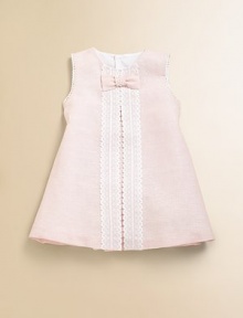 Airy and lovely linen is adorned with a pretty bow and embellished with front lace detail.Jewel necklineSleeveless with scalloped detailingBack buttonsA-line silhouette56% linen/44% cottonMachine wash coldImported Please note: Number of buttons may vary depending on size ordered. Airy and lovely linen is adorned with a pretty bow and embellished with front lace detail.Jewel necklineSleeveless with scalloped detailingBack buttonsA-line silhouette56% linen/44% cottonMachine wash coldImported Please note: Number of buttons may vary depending on size ordered.