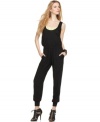 Score on-trend style with Bar III Front Row's sleeveless jumpsuit! This sporty look softens up with a lacy neckline.