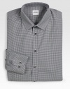 A modern look in slim-fitting Italain cotton, finished with a small collar and classic gingham checks. Buttonfront Small collar Italian cotton Dry clean Imported 