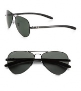 Exceptional style and craftsmanship, rendered in sleek metal. Available in black frames with green lenses.Metal100% UV ProtectionMade in Italy