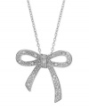 Tie this on for size. A sterling silver necklace dazzles with a bow and ribbon shaped pendant radiant with round-cut diamonds (1/10 ct. t.w.). Approximate length: 18 inches. Approximate drop: 3/4 inch. Approximate pendant width: 3/4 inch.