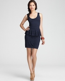 Exude on-trend style in the office and out with this chic Aqua knit dress adorned with playful peplum. Exude on-trend style in the office and out with this chic Aqua knit dress adorned with playful peplum.