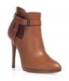 Luxurious ankle boots in camel leather - Rounded toe, fitted, ankle-high shaft with crossed strap - The 1 cm (.4) platform is made ​.​.of brown leather and the 10 cm (3.9) heel is also brown - Wear around the clock, with a sheath dress, skinny jeans, chinos