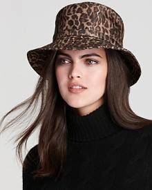 Top off your rainy day style with Eric Javits' belted, water-repellent bucket hat.