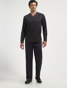 A striking jacquard shirt and easy-fitting pants crafted with dream-inspiring comfort in pure, mercerized cotton jersey. V-neck Piped trim Chest patch pocket Elastic waist Side slash pockets Inseam, about 32 Cotton; machine wash Imported 