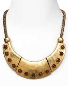 Channel your inner Egyptian goddess with this hammered gold tone necklace embellished with carnelian stones. The rope chain lays just right.