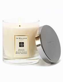 The scent of the season. Fill your home with the aroma of sweet chestnuts with this delectable limited-edition Deluxe Candle. Laced with nutmeg, cinnamon and ginger. Softened with caramel and cedarwood. Welcoming, warming and definitely most-wanted. Burn time is about 90 hours. The scent of the season. Fill your home with the aroma of sweet chestnuts with this delectable limited-edition Deluxe Candle. Laced with nutmeg, cinnamon and ginger. Softened with caramel and cedarwood. Welcoming, warming and definitely most-wanted. Burn time is about 90 hours.