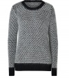 Ultra soft and equally chic, DKNYs black and white textural knit pullover is a contemporary staple guaranteed to give your outfit a cool, cozy finish - Rounded neckline, long sleeves, black ribbed trim - Classic straight fit - Team with tissue tees and leather leggings, or with fitted blouses and tailored skirts