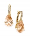 Add an extra hint of elegance to your evening wear. These classy drop earrings by City by City feature a pear-cut champagne cubic zirconia (10-1/4 ct. t.w.). Lever backing and setting crafted in gold tone mixed metal with clear cubic zirconia accents. Approximate drop: 1/2 inch.