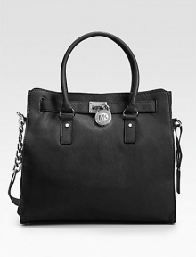 Beautifully tailored and versatile design of rich leather, finished with double top handles and a shoulder strap.Double top handles, 5 drop Chain and leather shoulder strap, 12 drop Magnetic snap closure Protective metal feet One inside zip pocket Four inside open pockets Fully lined 14W X 13H X 5½D Imported Beautifully tailored and versatile design of rich leather, finished with double top handles and a shoulder strap.Double top handles, 5 drop Chain and leather shoulder strap, 12 drop Magnetic snap closure Protective metal feet One inside zip pocket Four inside open pockets Fully lined 14W X 13H X 5½D Imported