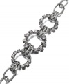 Link positive. Alfani's chic chain link bracelet gets a glamorous touch with sparkling crystal-adorned circles in the center. Made in hematite tone mixed metal, it's an eye-catching accent for your everyday wardrobe. Approximate length: 7-1/2 inches + 1-inch extender.