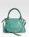 EXCLUSIVELY AT SAKS ASH, RUBY AND TEAL. Luxe calfskin defines this contoured crossbody design, finished with tonal stitching for textured appeal.Tennis-wrapped double top handles, 6 drop Adjustable crossbody strap, 17½ drop Top zip closure Hidden open pocket under front flap One inside zip pocket One cell phone pocket Cotton lining 14½W X 11H X 4½D Made in Italy
