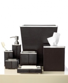 Bring the exotic appeal of the world's chicest hotels into your very own bath with the Roselli Trading Company Embossed Faux Crocodile tumbler. Featuring imitation crocodile embossing, stainless steel accents and sleek shapes for a cosmopolitan, traveled look. Bring the exotic appeal of the world's chicest hotels into your very own bath with the Roselli Trading Company Embossed Faux Crocodile tumbler. Featuring imitation crocodile embossing, stainless steel accents and sleek shapes for a cosmopolitan, traveled look.