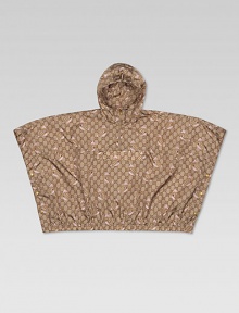 A waterproof nylon, hooded poncho with front pocket and side snaps is adorned with Gucci zoo print and signature web detail.Attached hoodPoncho sleevesHalf-zip frontCenter flap pocketSnap sidesPolyamideMachine washImported A waterproof nylon, hooded poncho with front pocket and side snaps is adorned with Gucci zoo print and signature web detail.Attached hoodPoncho sleevesHalf-zip frontCenter flap pocketSnap sidesPolyamideMachine washImported