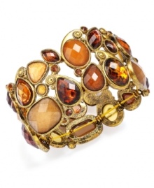 Seasonally stylish. Crafted in antique gold tone mixed metal, Style&co.'s chic stretch bracelet is bedecked with brown-hued acrylic and glass beads. It's a fitting--and fashionable!--addition to your fall jewelry collection. Approximate length: 7-1/2 inches.