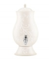 With an elegant white-on-white pattern featuring an embossed vine motif and radiant glaze, the Opal Innocence Carved beverage dispenser adds easy refinement to anytime entertaining.  Qualifies for Rebate