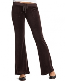 Snap-patch back pockets lend a utility-inspired feel to Juicy Couture's signature velour lounge pants.