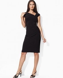 A shirred asymmetrical neckline and delicate ruching at the left hip lend an air of modern elegance to this slinky dress, rendered in sleek matte jersey with a hint of stretch for a flattering fit.