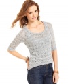 Layer-up this season in an open-knit sweater that comes loaded with metallic threading for a shot of pizzazz!